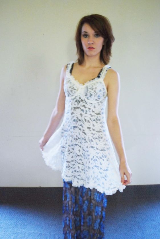 Pretty sheer lace slip to layer a la Free People style. Stretchy 