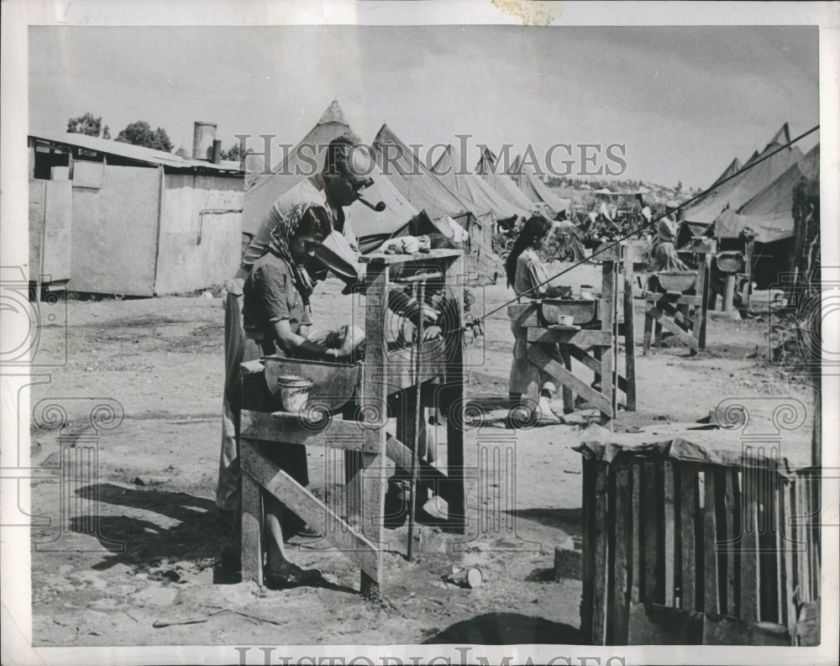   community sink in the street at Zarnuqa. Photo measures 9 x 7.25