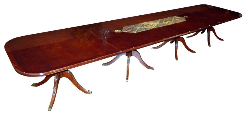   burl table will seat twenty comfortably and can contract to 9 feet