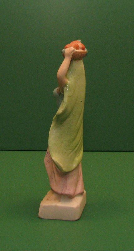 Occupied Japan MADSON Bisque figurine Lady with basket of fruit on 
