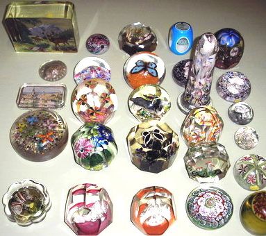 LOOK AT OUR LARGE COLLECTION OF PAPERWEIGHTS, PLEASE, WERE ACTUALLY 