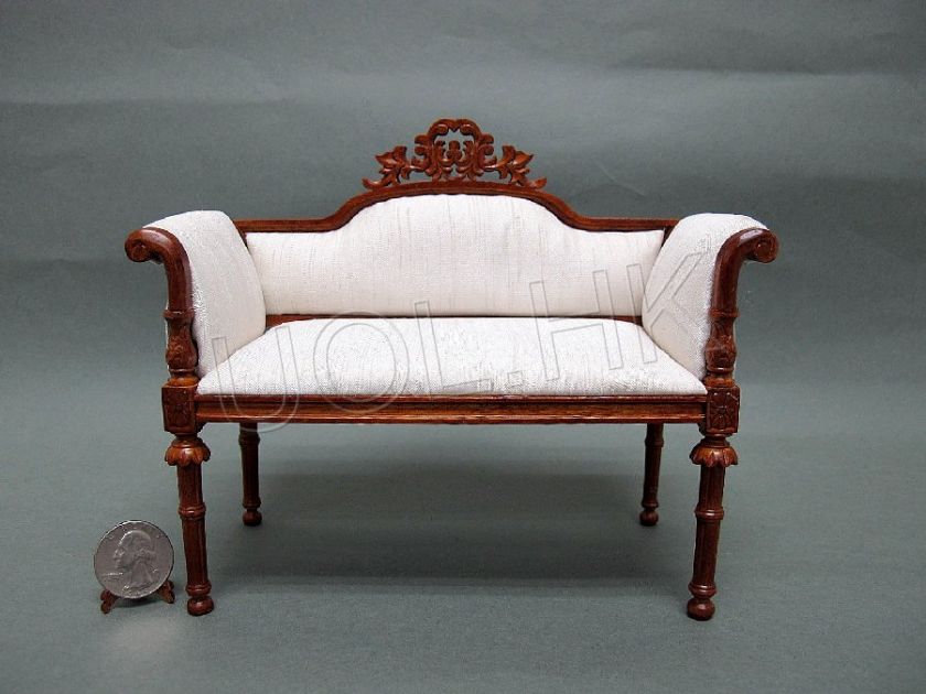 Walnut wood carved farme with soft seat.